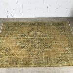 Vintage hand woven wool rug yellow