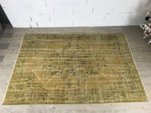 Vintage handwoven woolen rug yellow