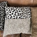 Set of 5 tan printed pillows