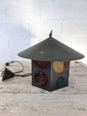 Lantern in metal and colored glass by Erik Hoglund