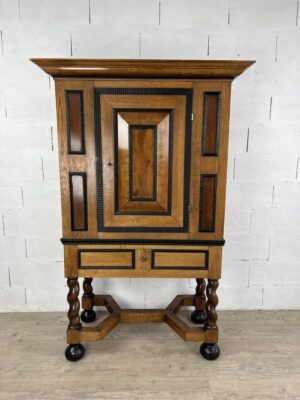 Cabinet on twisted column base