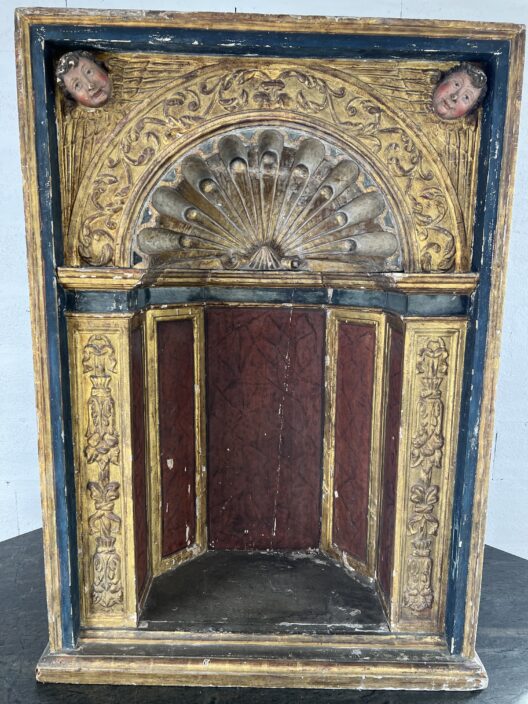 Carved wooden theater niche