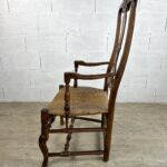 Rococo chair with high back and woven straw seat